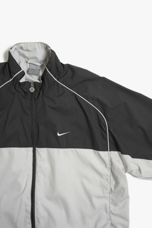 NIKE CURVE DESIGN TRACK JACKET 