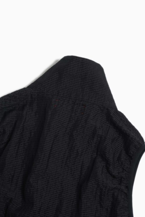 UNEVEN VEST