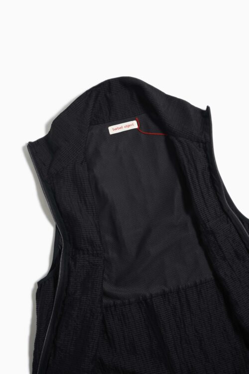 UNEVEN VEST