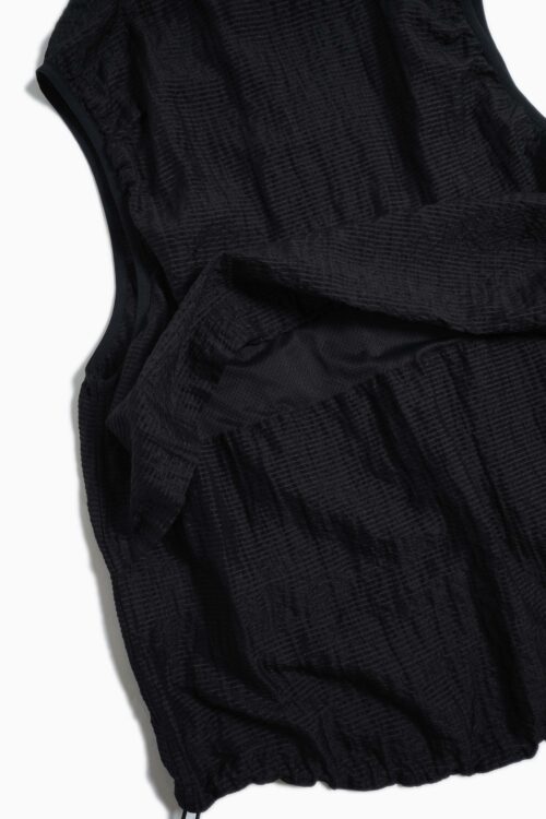UNEVEN VEST
